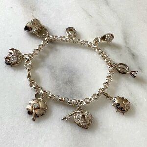 Sterling silver charm bracelet with 8 charms